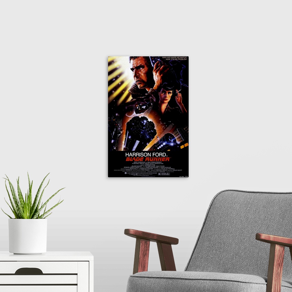 A modern room featuring Big, vertical movie advertisement for Blade Runner, with a profile headshot of Harrison Ford at t...
