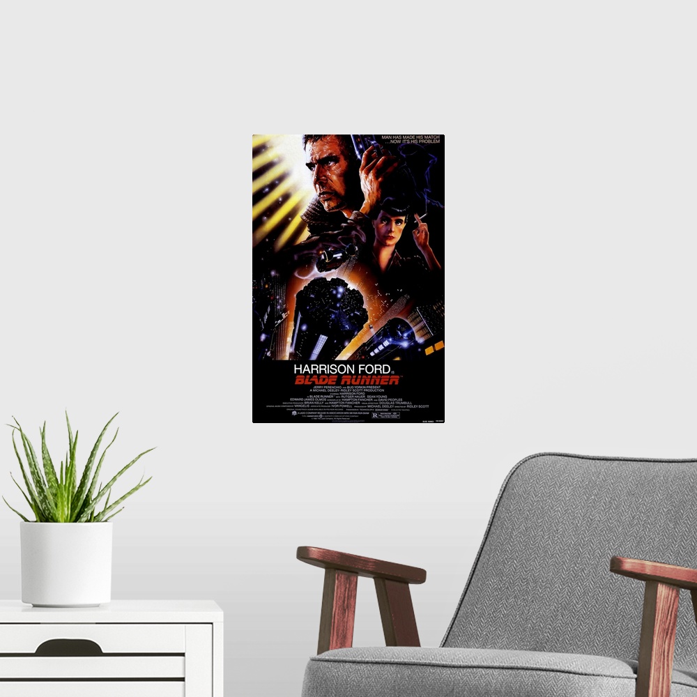 A modern room featuring Big, vertical movie advertisement for Blade Runner, with a profile headshot of Harrison Ford at t...