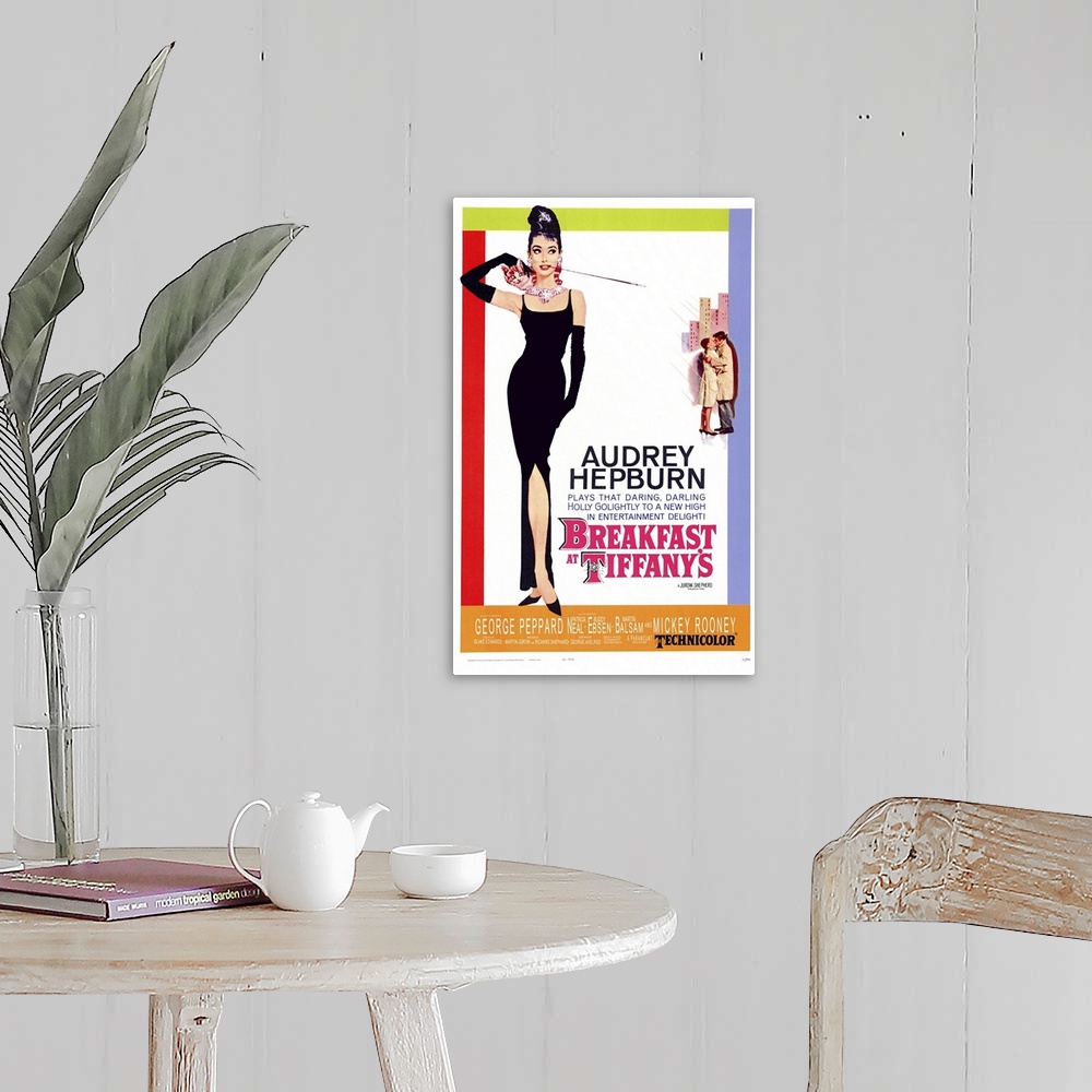 A farmhouse room featuring Movie poster for "Breakfast at Tiffany's". It shows Audrey Hepburn standing in a black gown with ...
