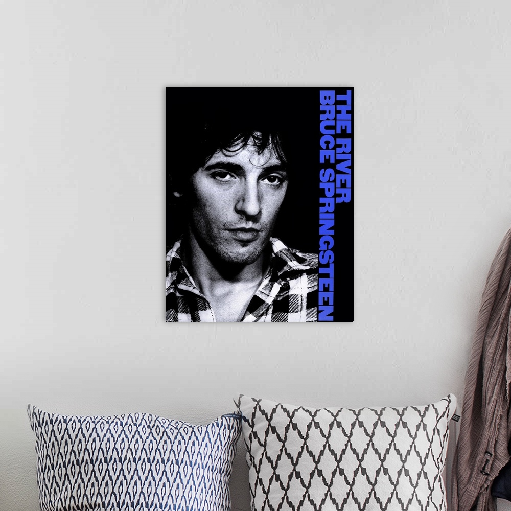 A bohemian room featuring Movie poster for the 2003 concert film Bruce Springsteen and the E Street Band featuring a black ...