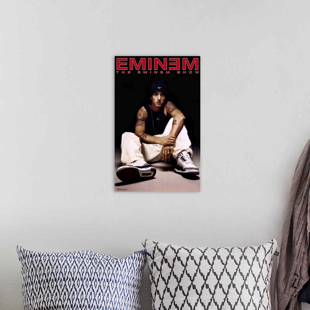 A bohemian room featuring Concert poster for rapper Marshall Mather, also known as Slim Shady.  He is an American rapper, r...