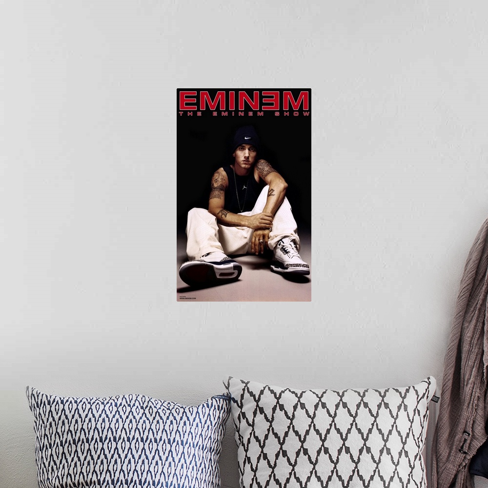 A bohemian room featuring Concert poster for rapper Marshall Mather, also known as Slim Shady.  He is an American rapper, r...