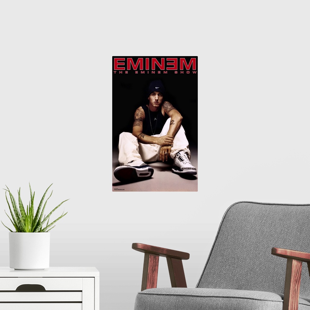 A modern room featuring Concert poster for rapper Marshall Mather, also known as Slim Shady.  He is an American rapper, r...
