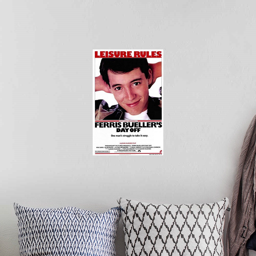 A bohemian room featuring Movie poster of "Ferris Bueller's Day Off" with Matthew Broderick taking up majority of the poste...
