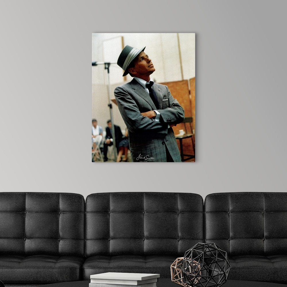A modern room featuring Photograph of Frank Sinatra looking off into the distance with blurred people in the background.