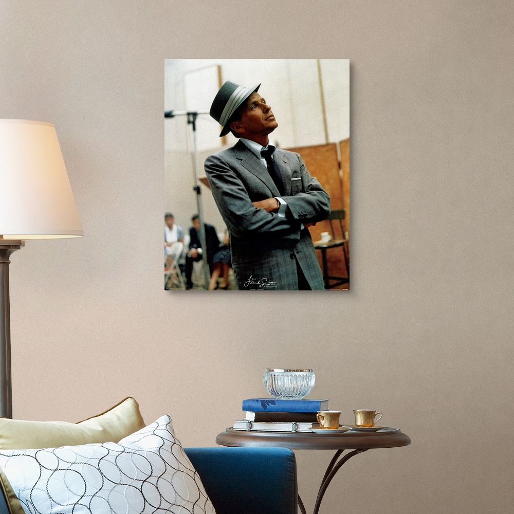 A traditional room featuring Photograph of Frank Sinatra looking off into the distance with blurred people in the background.