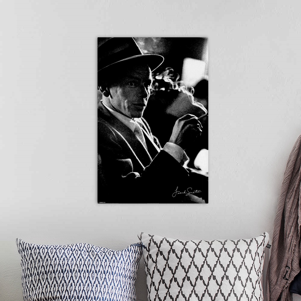 A bohemian room featuring Photograph of American singer and actor Francis Albert Sinatra.  He found his success as a solo a...