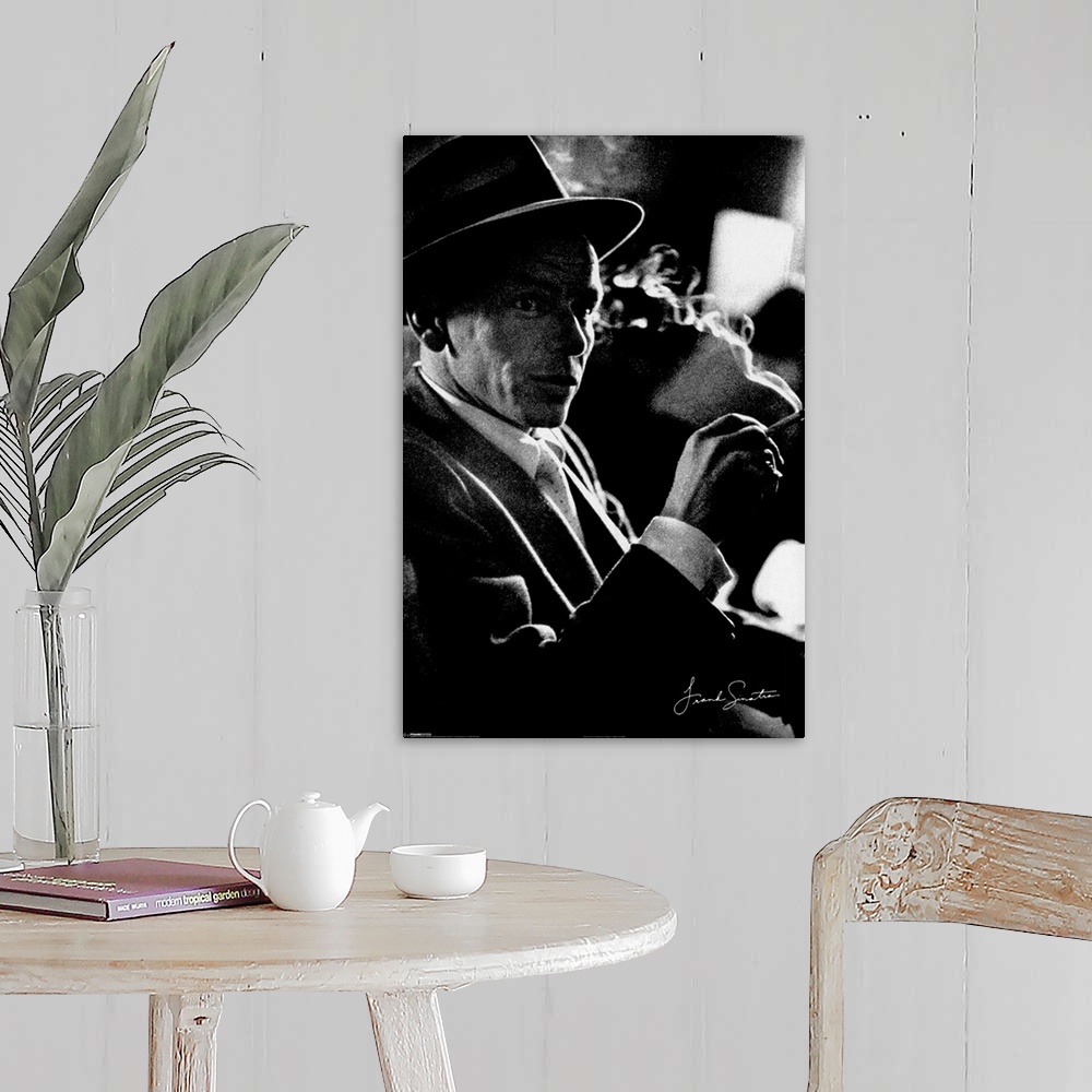A farmhouse room featuring Photograph of American singer and actor Francis Albert Sinatra.  He found his success as a solo a...