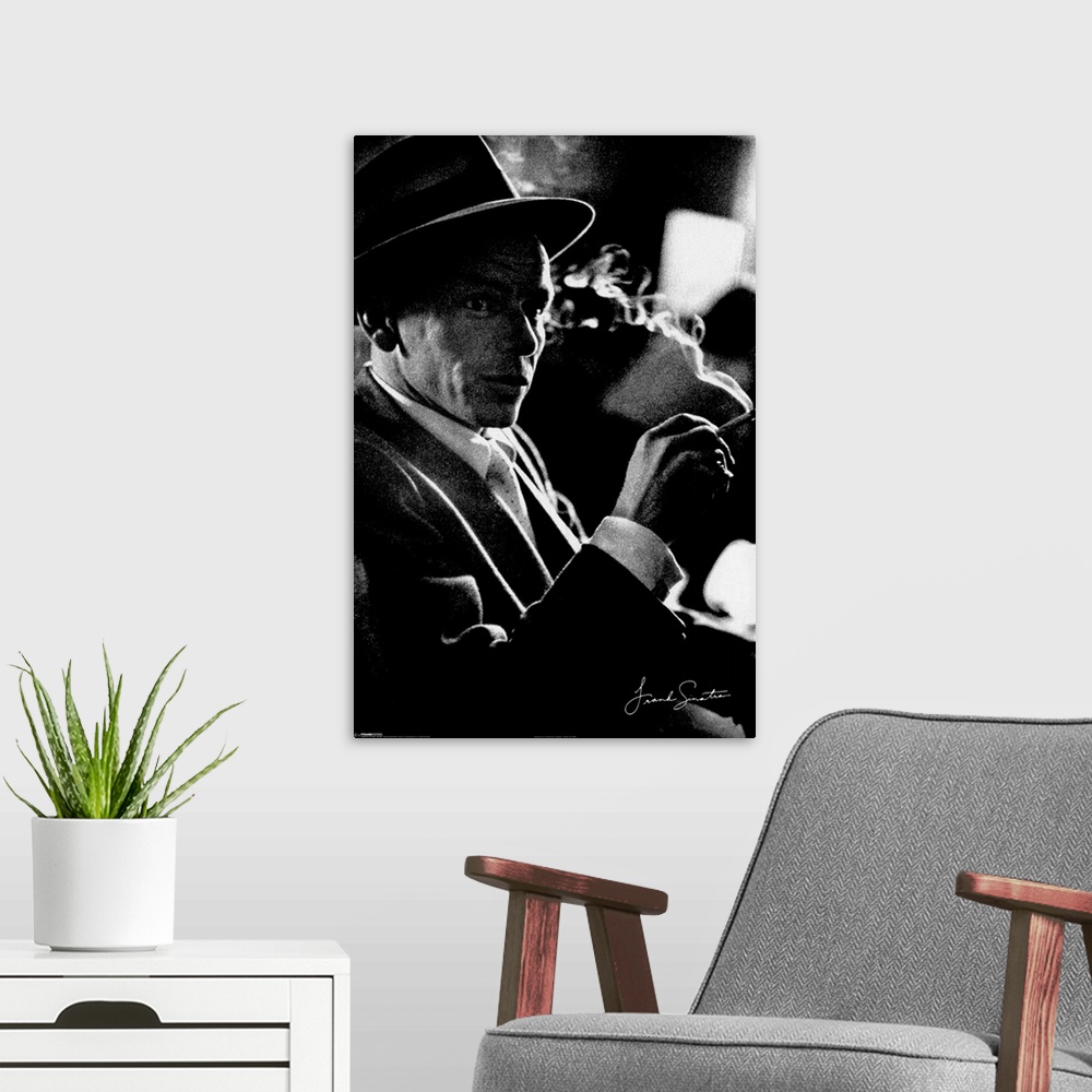 A modern room featuring Photograph of American singer and actor Francis Albert Sinatra.  He found his success as a solo a...