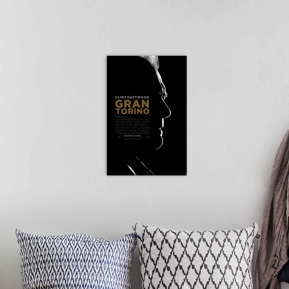 A bohemian room featuring Gran Torino - Movie Poster