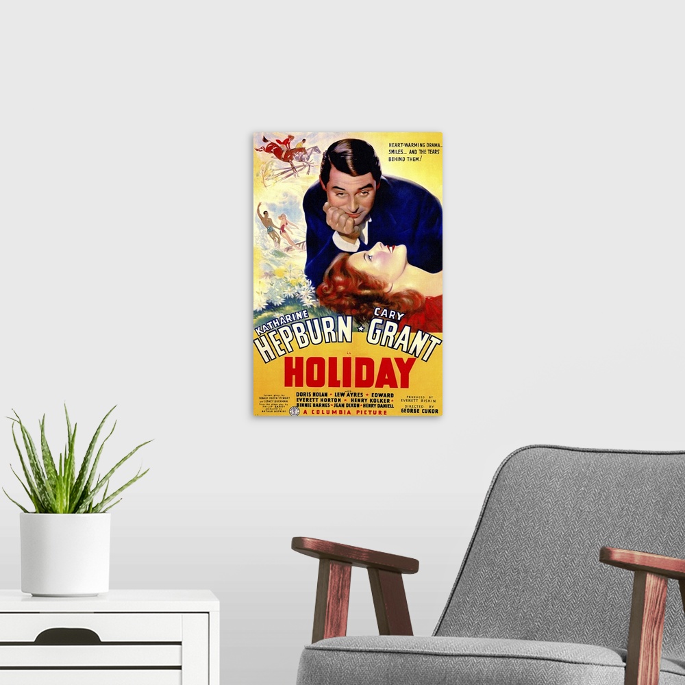 A modern room featuring Poster for the classic movie "Holiday" debuting in 1938. It shows the female lead laying her head...
