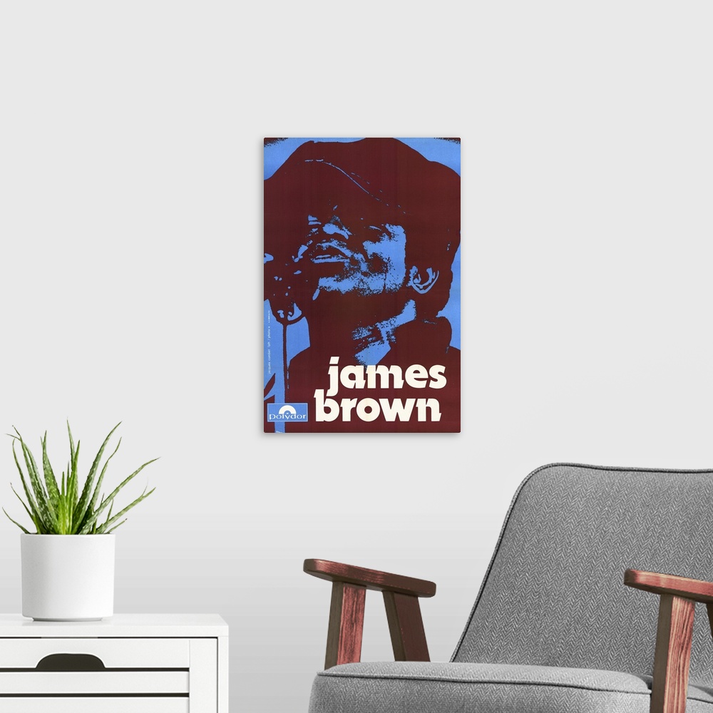 A modern room featuring A vintage poster of James Brown that uses only blue and a deep red color to silhouette his portrait.