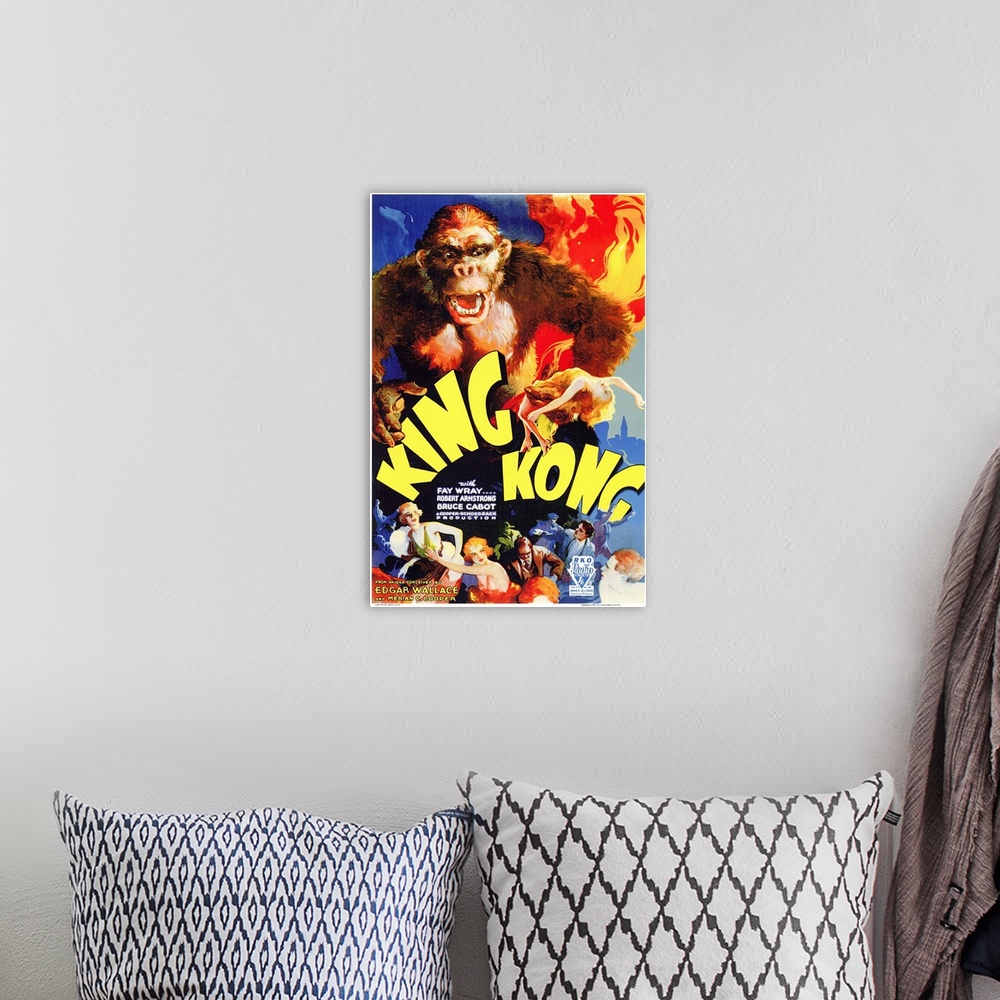 A bohemian room featuring Poster for the 1933 movie King Kong. It shows King Kong towering over people at the bottom of the...