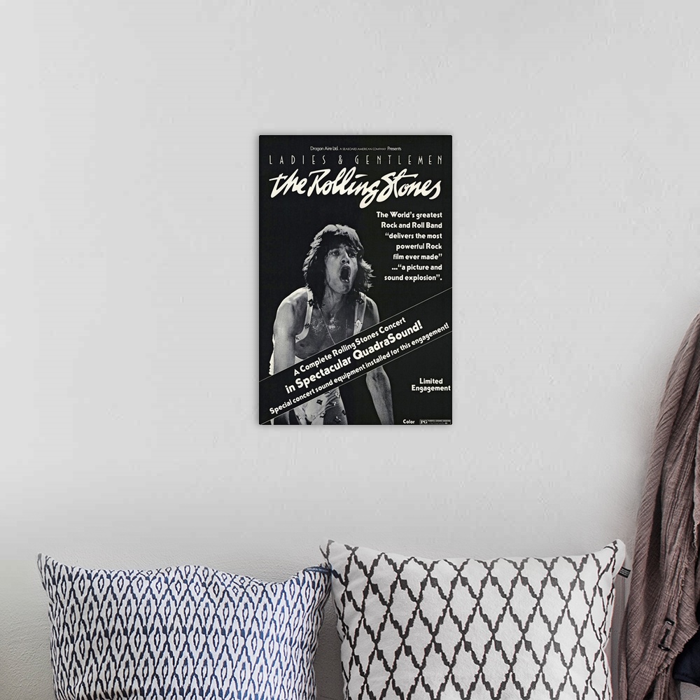 A bohemian room featuring Vintage poster of the Rolling Stones movie concert that premiered in 1974. Mick Jagger is the onl...