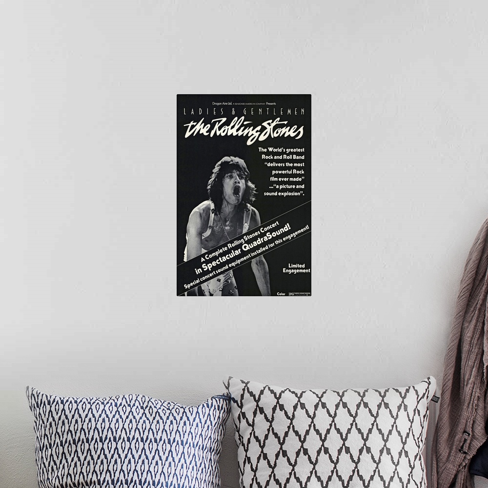 A bohemian room featuring Vintage poster of the Rolling Stones movie concert that premiered in 1974. Mick Jagger is the onl...