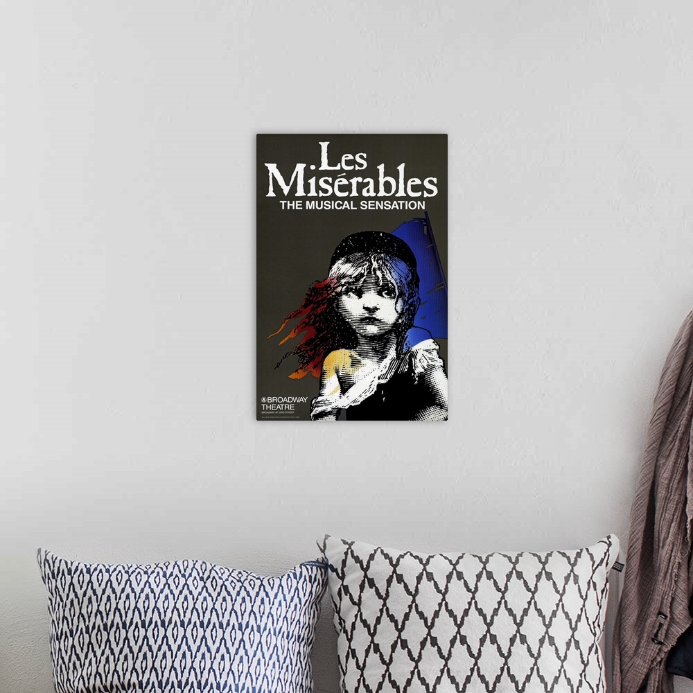A bohemian room featuring Large Broadway advertisement of Les Miserables on canvas.