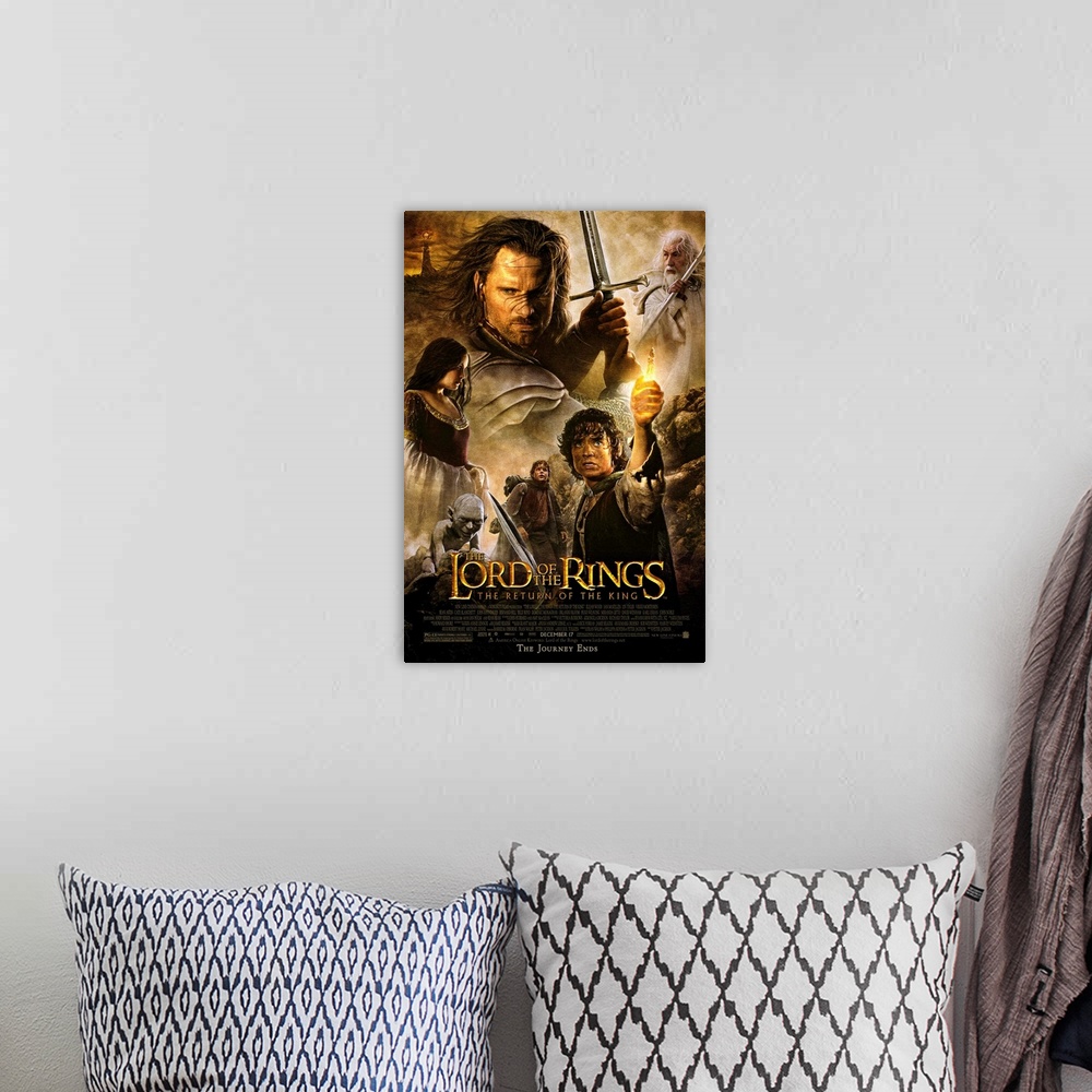 A bohemian room featuring Movie poster for the final installment of The Lord of the Rings. It highlights most of the main c...