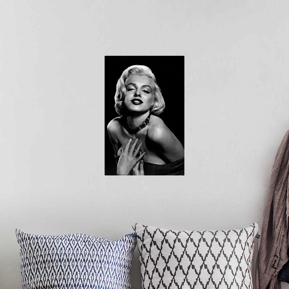 A bohemian room featuring Vintage black and white photograph of the actress leaning in and holding her hands to her chest, ...