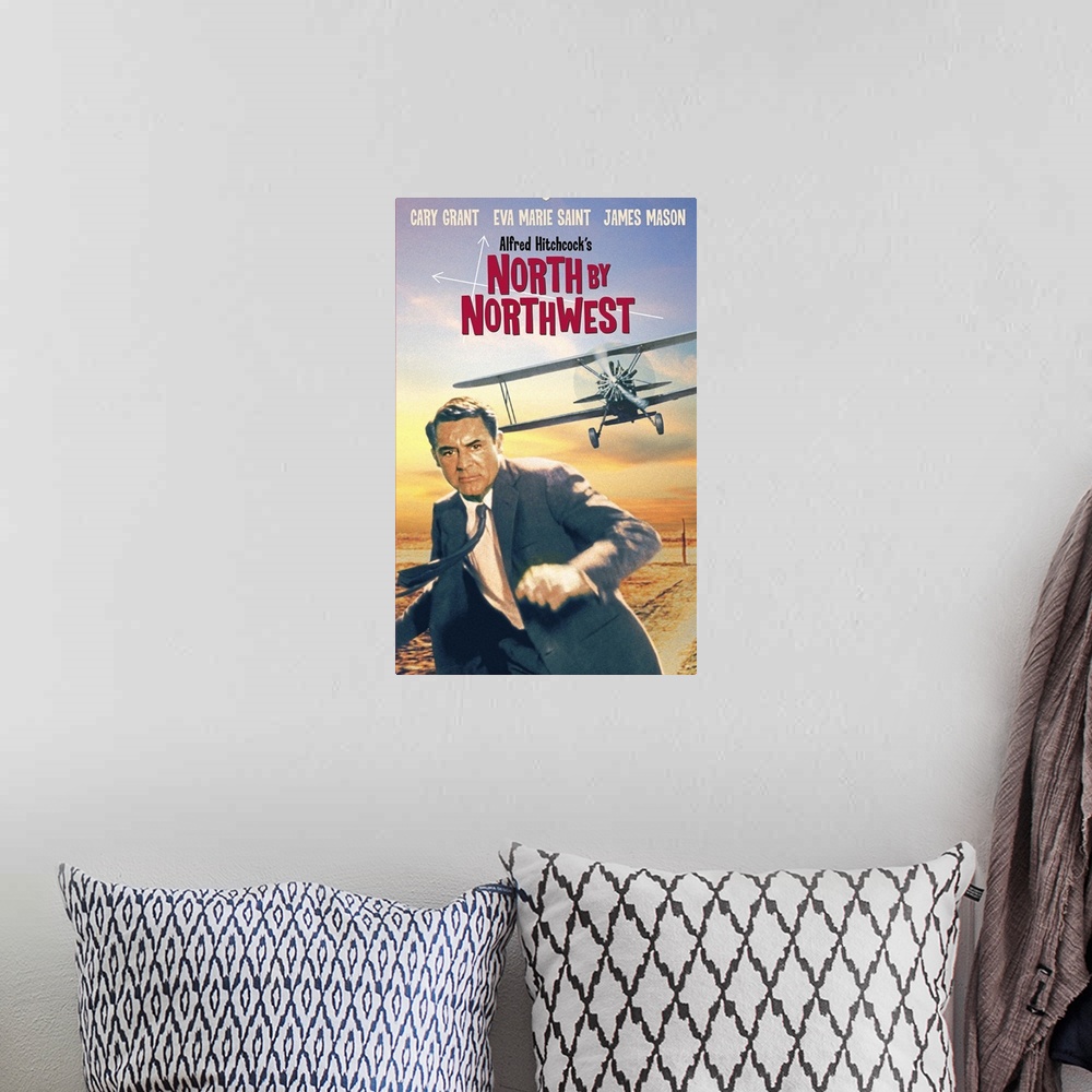 A bohemian room featuring Movie poster for Alfred Hitchcock's classic 1959 film North By Northwest starring Cary Grant, Eva...