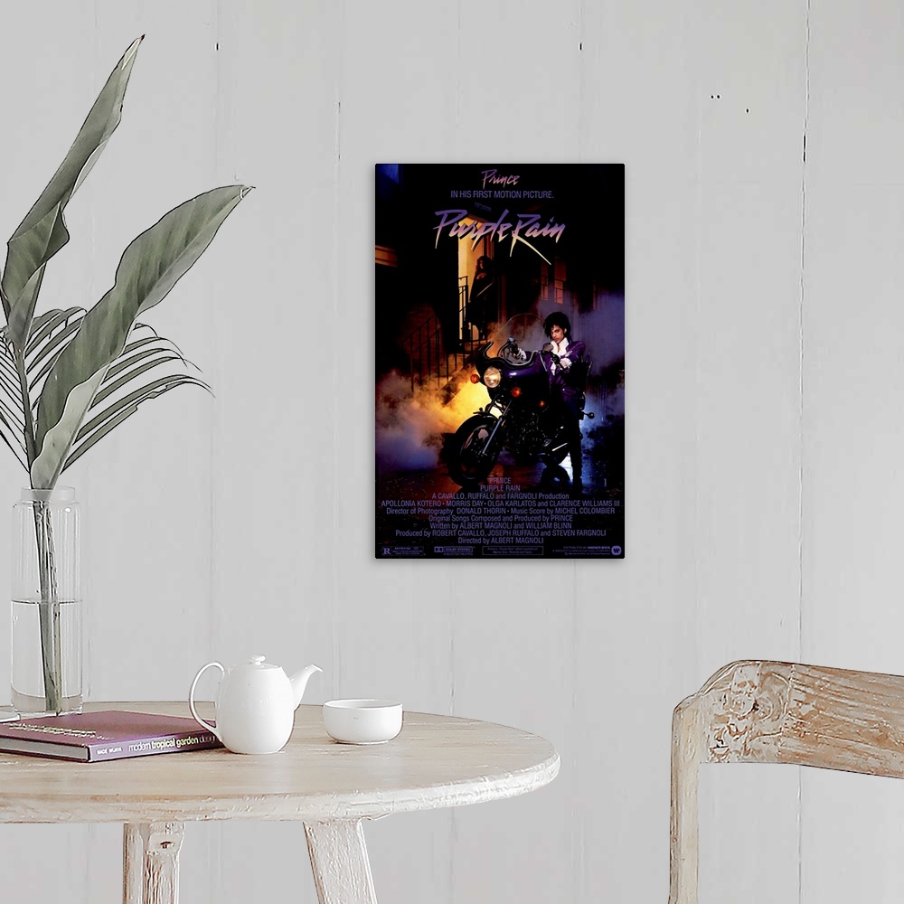 A farmhouse room featuring Vintage movie poster for the movie Purple Rain featuring the music artist Prince with a picture o...