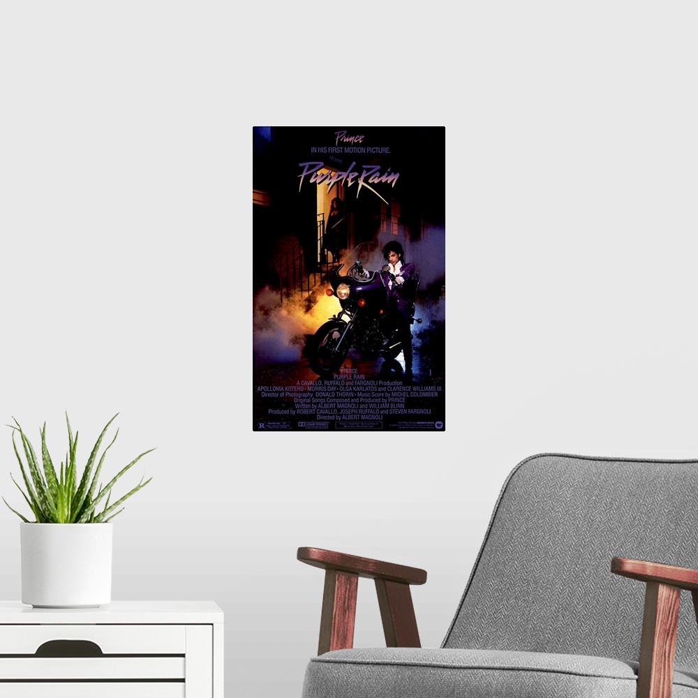 A modern room featuring Vintage movie poster for the movie Purple Rain featuring the music artist Prince with a picture o...