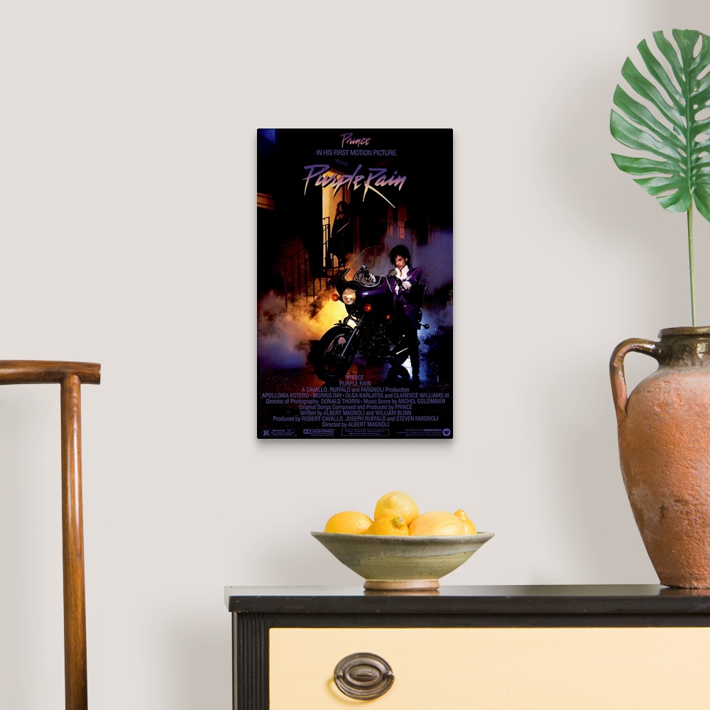 A traditional room featuring Vintage movie poster for the movie Purple Rain featuring the music artist Prince with a picture o...