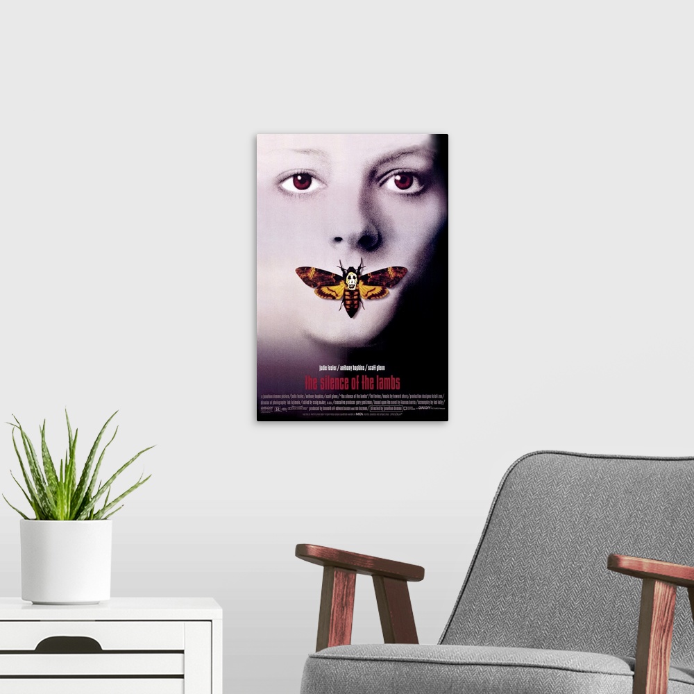 A modern room featuring Vertical, oversized movie advertisement for the 1990 film, The Silence of the Lambs, starring Jod...