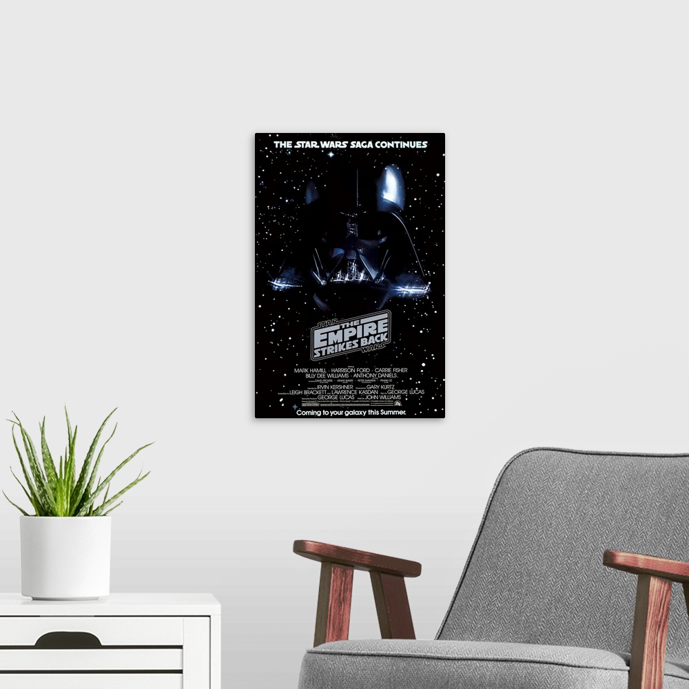 A modern room featuring Giant, vertical movie image on canvas for The Empire Strikes Back, with Darth Vader's head on a g...