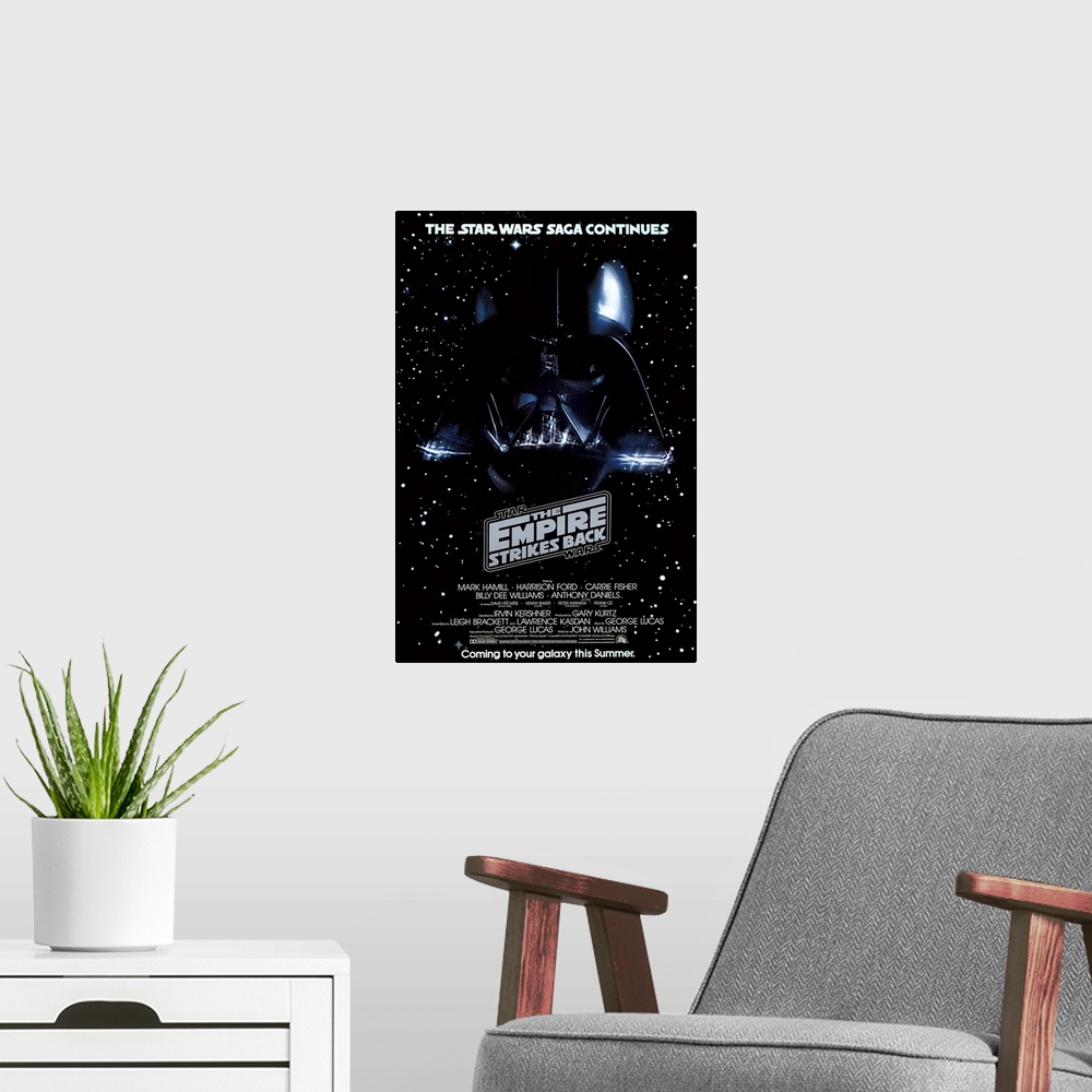 A modern room featuring Giant, vertical movie image on canvas for The Empire Strikes Back, with Darth Vader's head on a g...