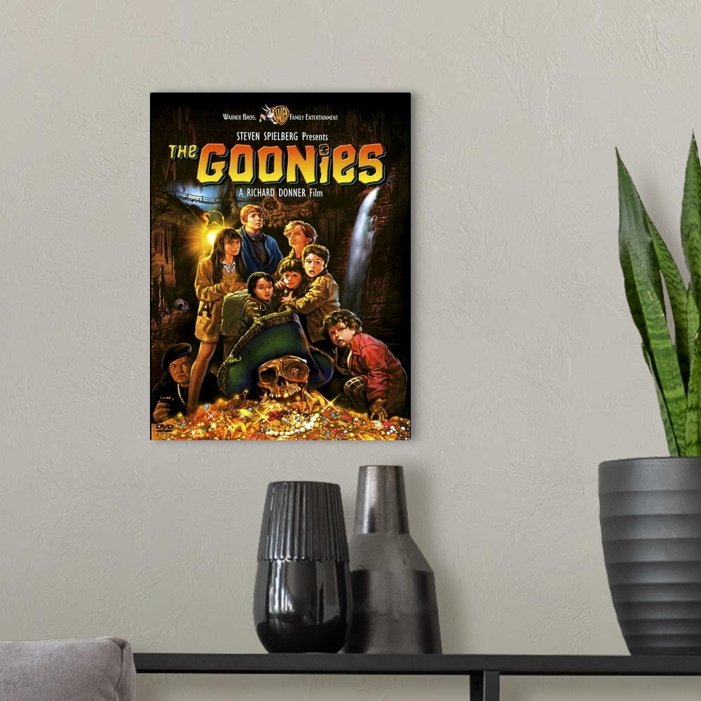 A modern room featuring Movie poster for the 1980s movie Goonies with a drawing of all the child characters standing with...