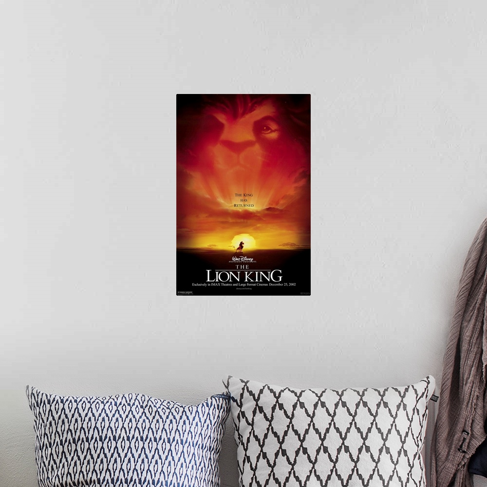 A bohemian room featuring Movie poster for the 2002 Disney animated movie The Lion King with Simba high on a rock overlooki...