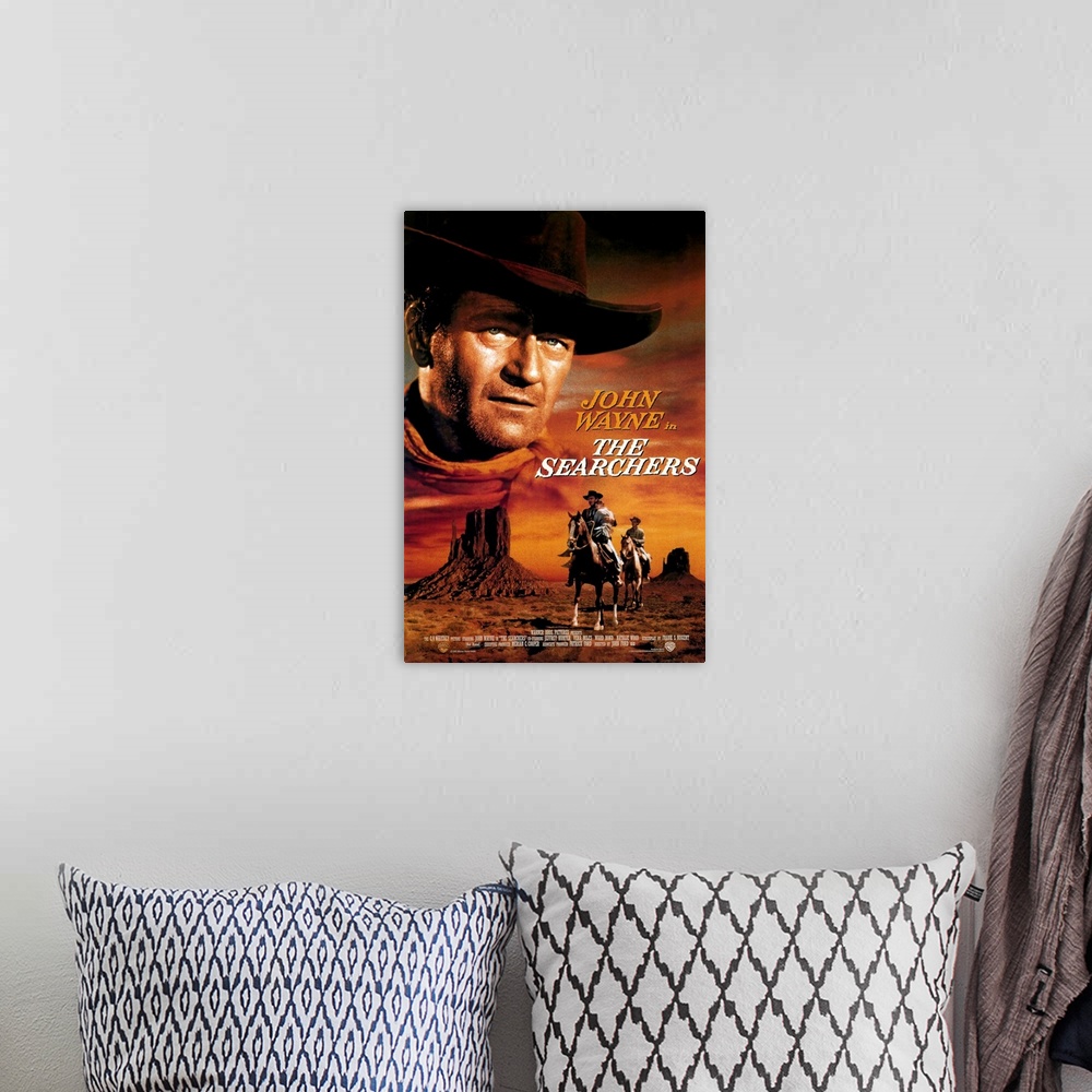 A bohemian room featuring The classic Ford western, starring John Wayne as a hard-hearted frontiersman who spends years dog...