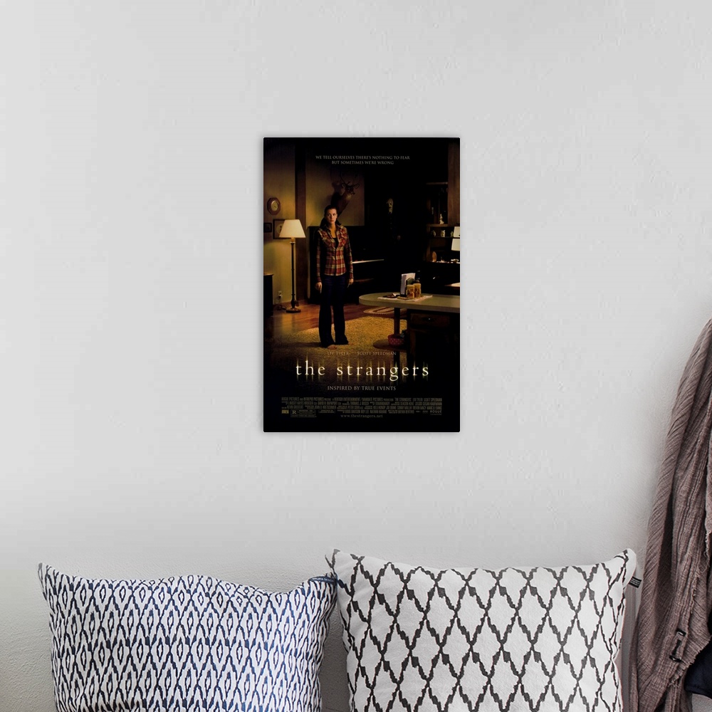 A bohemian room featuring The Strangers - Movie Poster