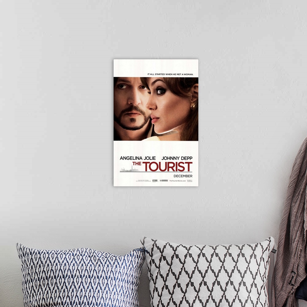 A bohemian room featuring The Tourist - Movie Poster