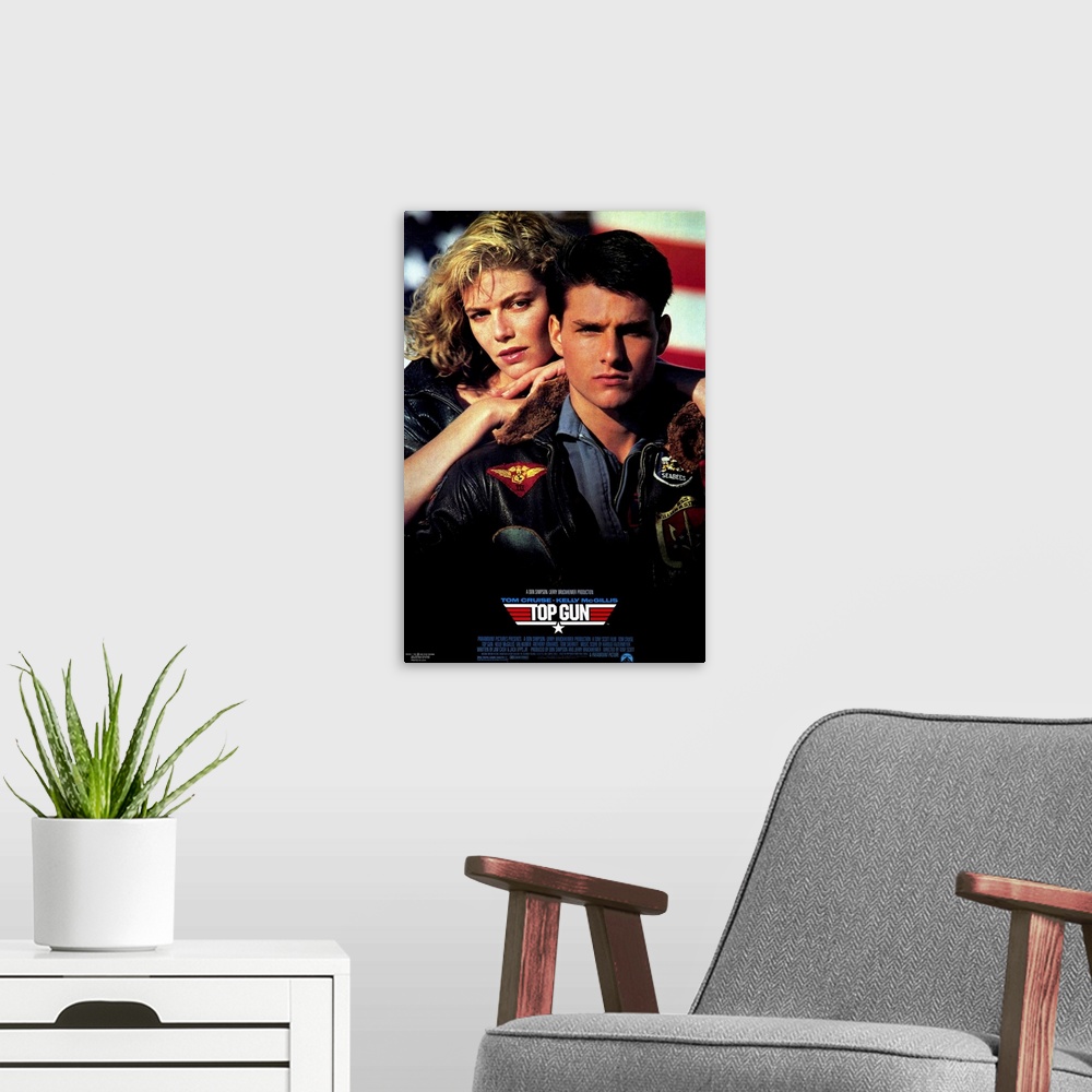 A modern room featuring Movie poster for the hit film "Top Gun". Tom Cruise and his love interest are shown on the poster.