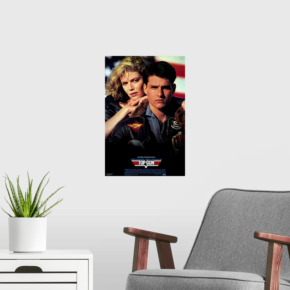 A modern room featuring Movie poster for the hit film "Top Gun". Tom Cruise and his love interest are shown on the poster.
