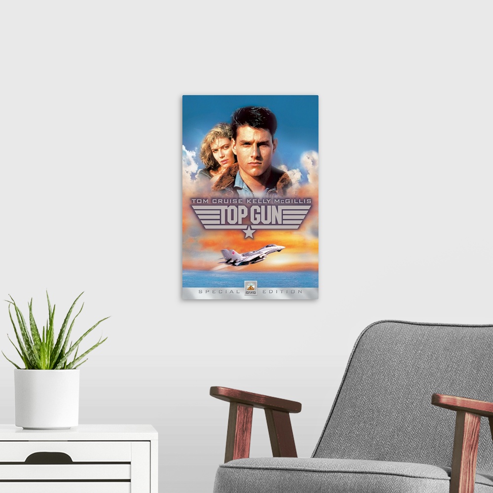 A modern room featuring Movie poster for Top Gun with Tom Cruise and Kelly McGillis in the sky as a military plane takes ...