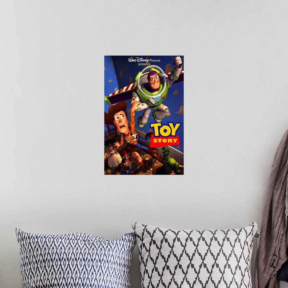 A bohemian room featuring Portrait, large movie poster of Toy Story.  Buzz lightyear flying through the air, Woody holding ...