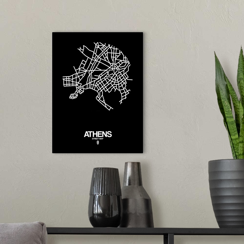 A modern room featuring Minimalist art map of the city streets of Athens in black and white.