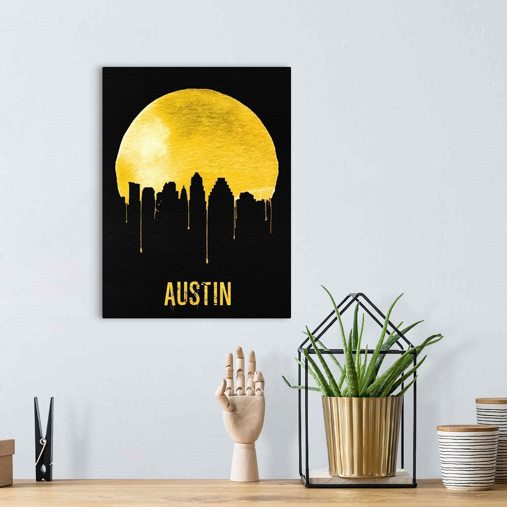 A bohemian room featuring Contemporary watercolor artwork of the Austin city skyline, in silhouette.