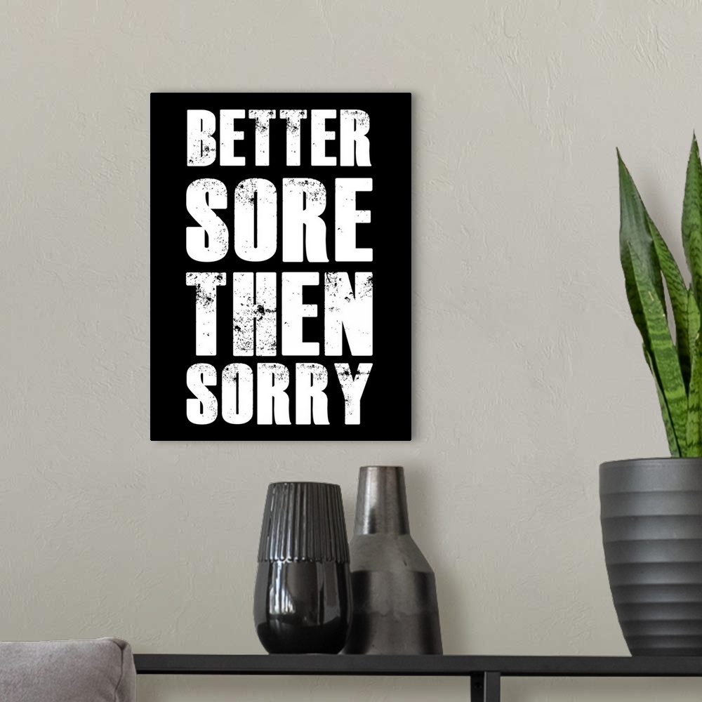 A modern room featuring Better Sore Then Sorry