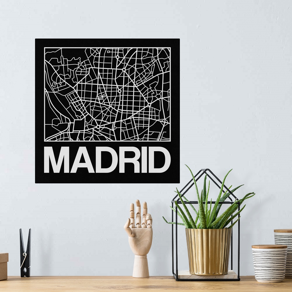A bohemian room featuring Contemporary minimalist art map of the city streets of Madrid.