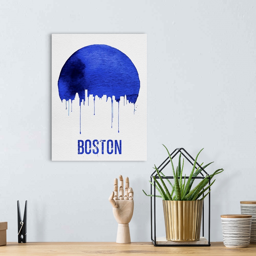 A bohemian room featuring Contemporary watercolor artwork of the Boston city skyline, in silhouette.