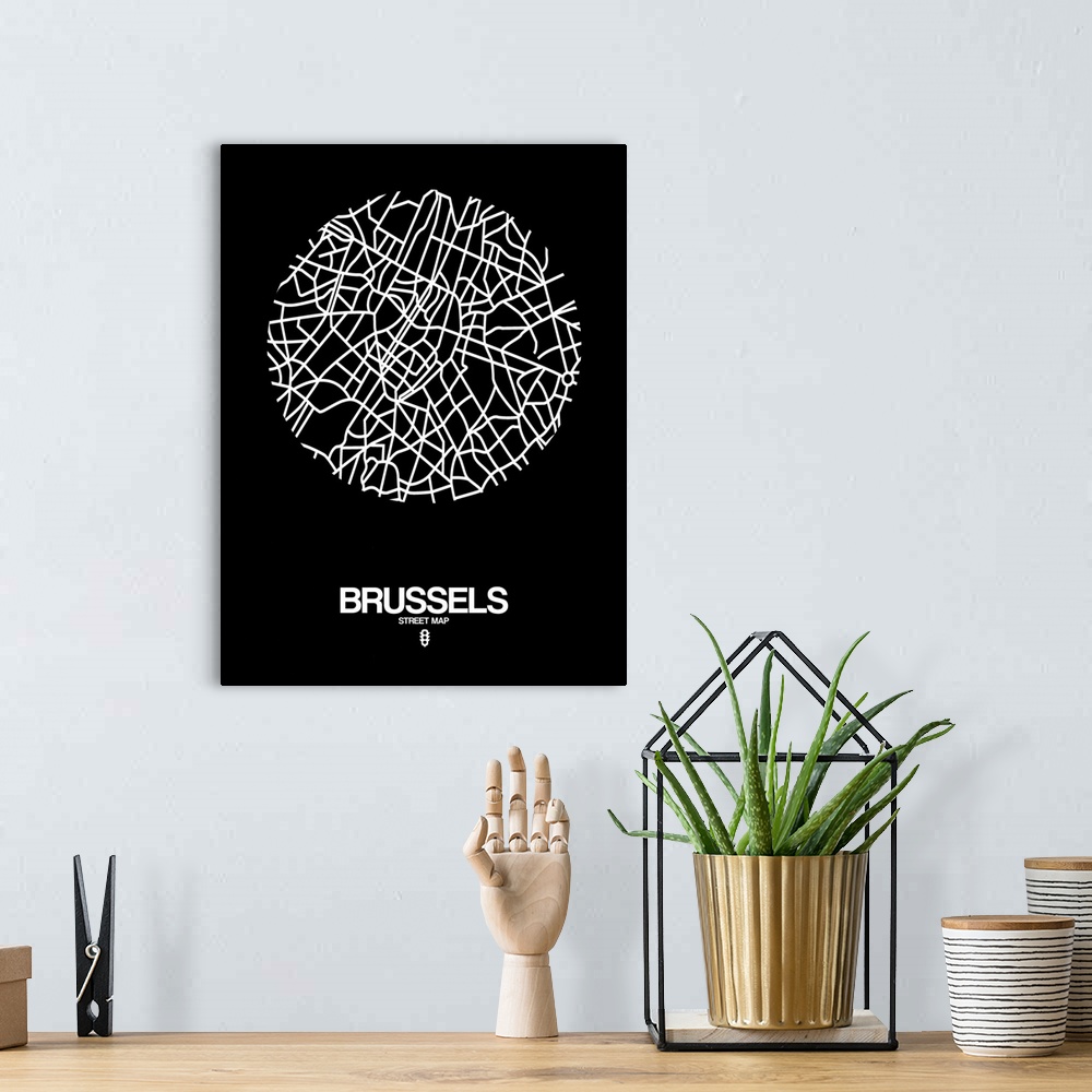 A bohemian room featuring Minimalist art map of the city streets of Brussels in black and white.