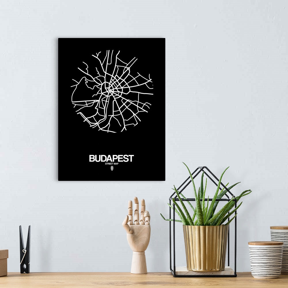 A bohemian room featuring Minimalist art map of the city streets of Budapest in black and white.