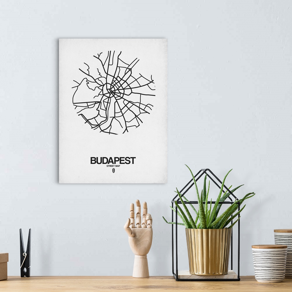 A bohemian room featuring Minimalist art map of the city streets of Budapest in white and black.