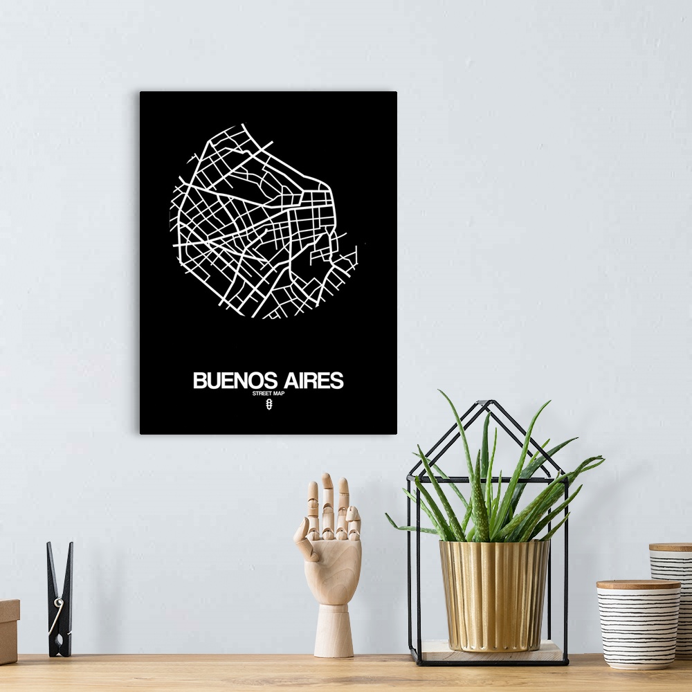A bohemian room featuring Minimalist art map of the city streets of Buenos Aires in black and white.
