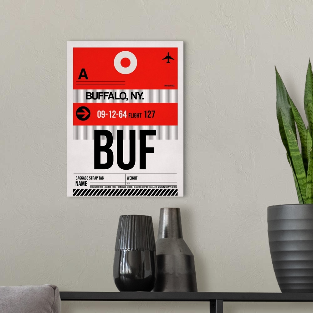 A modern room featuring BUF Buffalo Luggage Tag I