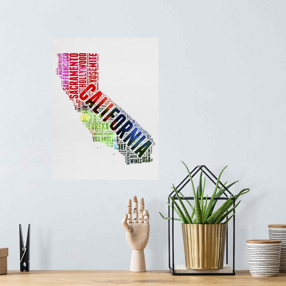 A bohemian room featuring Watercolor typography art map of the US state California.