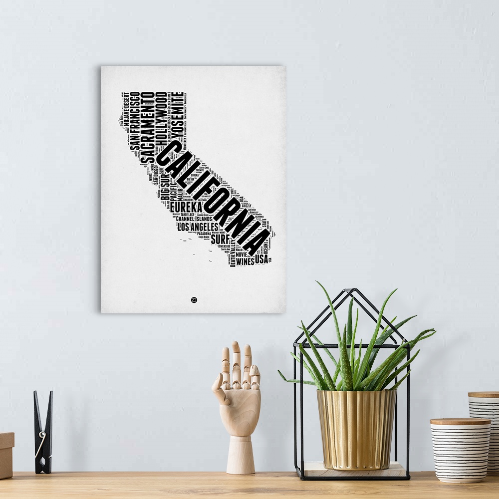 A bohemian room featuring Typography art map of the US state California.